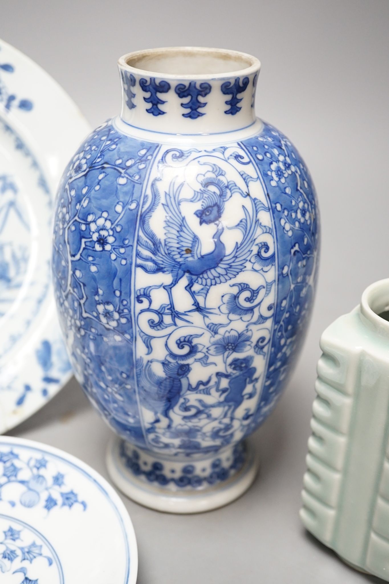 A Chinese blue and white ovoid vase, 20cm a similar dish and plates and celadon glazed vase